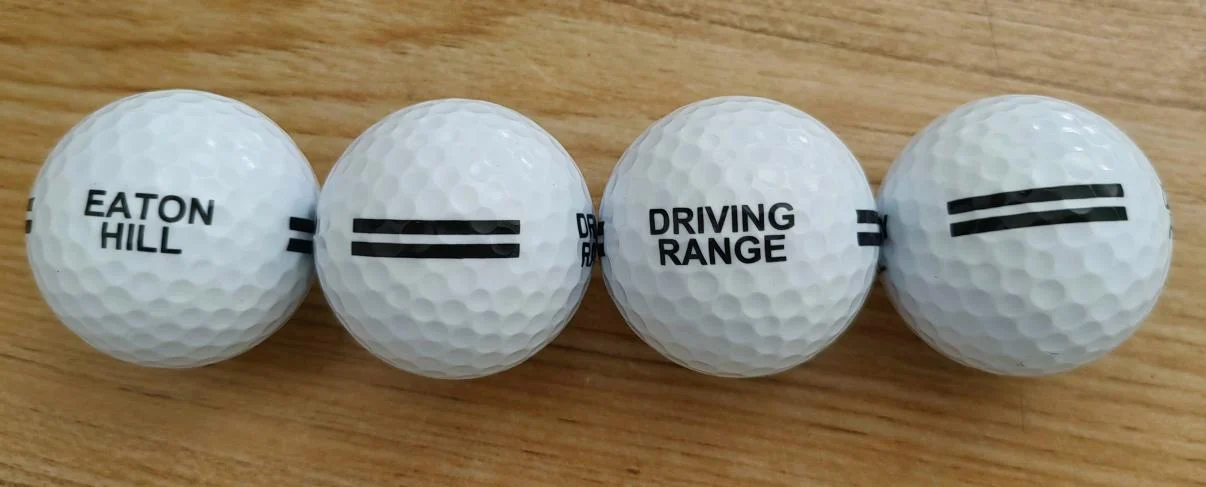 Eaton Hill Driving Range golf balls with a custom black print